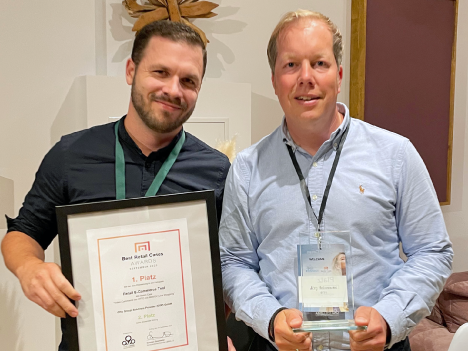 Marcus Müller (OSP) und Jörg Heinemann (OTTO) mit der Auszeichnung des Best Retail Cases Award
